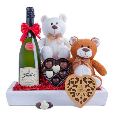 Chocolates, two teddies and sparkling wine