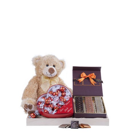 Love and chocolate basket with chocolates and a teddy bear